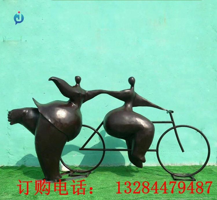铸铜抽象人物骑自行车雕塑