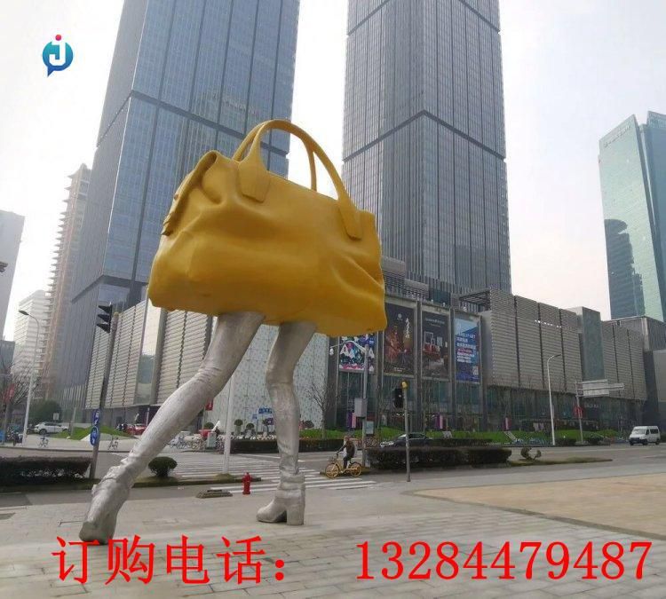 不锈钢手提包拟人雕塑