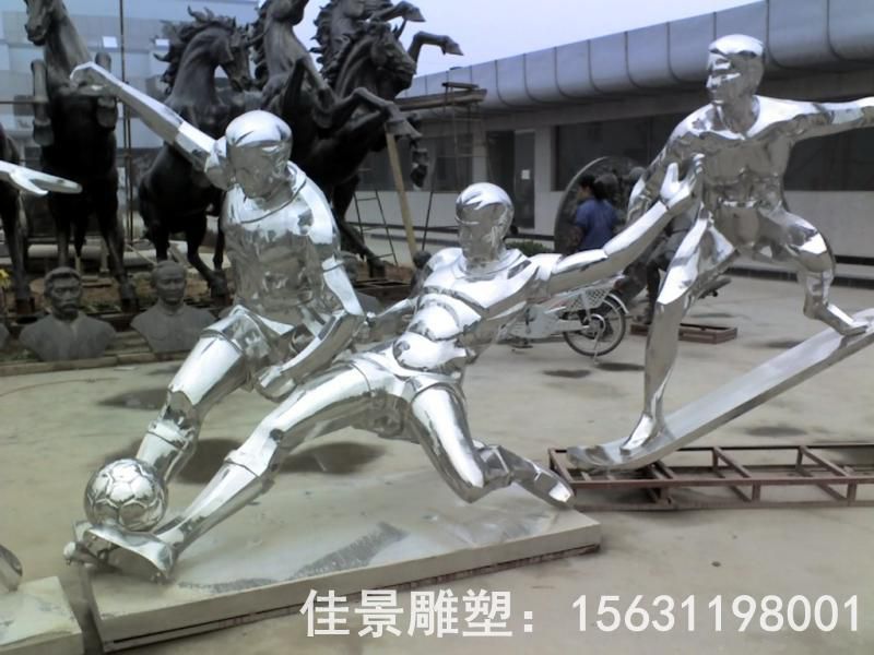 不锈钢抽象踢足球雕塑