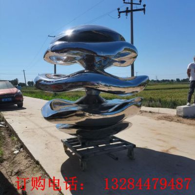 不锈钢镜面海浪圆柱雕塑