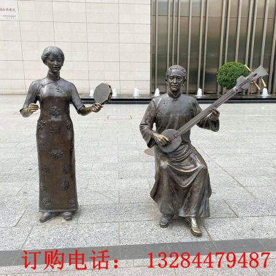 铸铜人物唱戏雕塑