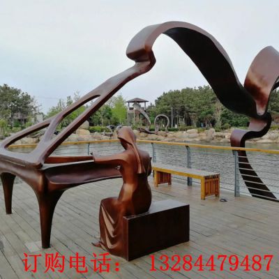 铸铜抽象人物弹钢琴雕塑
