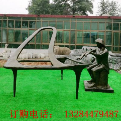 铸铜人物弹钢琴雕塑