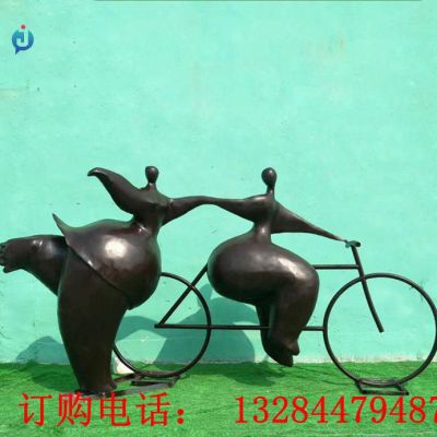 铸铜抽象人物骑自行车雕塑