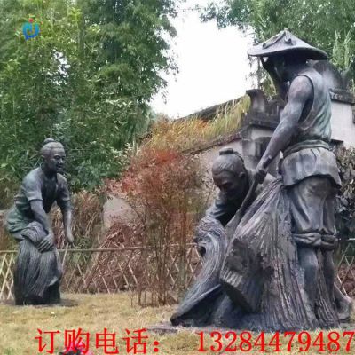 铸铜人物割水稻雕塑