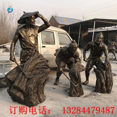铸铜人物割稻谷雕塑