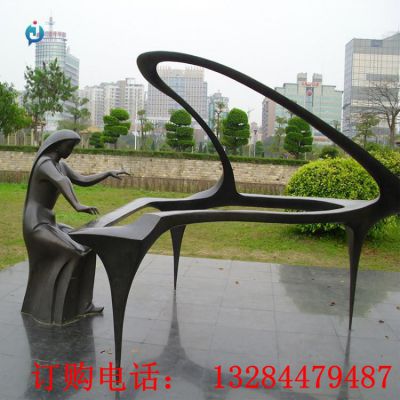 铸铜抽象人物弹钢琴雕塑