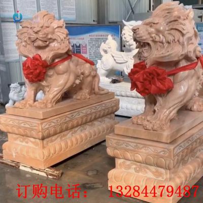 石雕晚霞红狮子雕塑