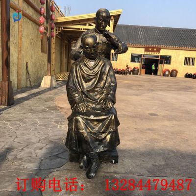 铸铜人物理发雕塑