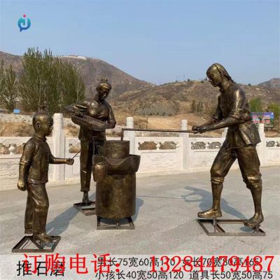 铸铜推石磨雕塑