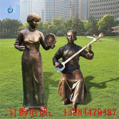 铸铜人物弹唱雕塑