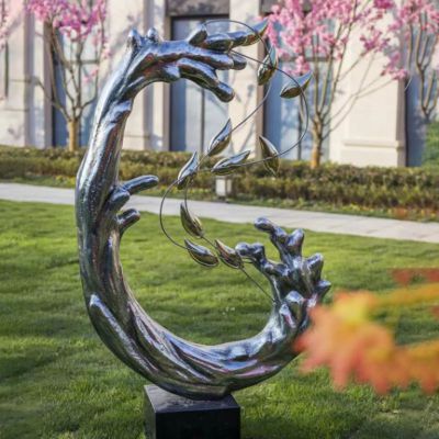不锈钢抽象浪花鱼群雕塑